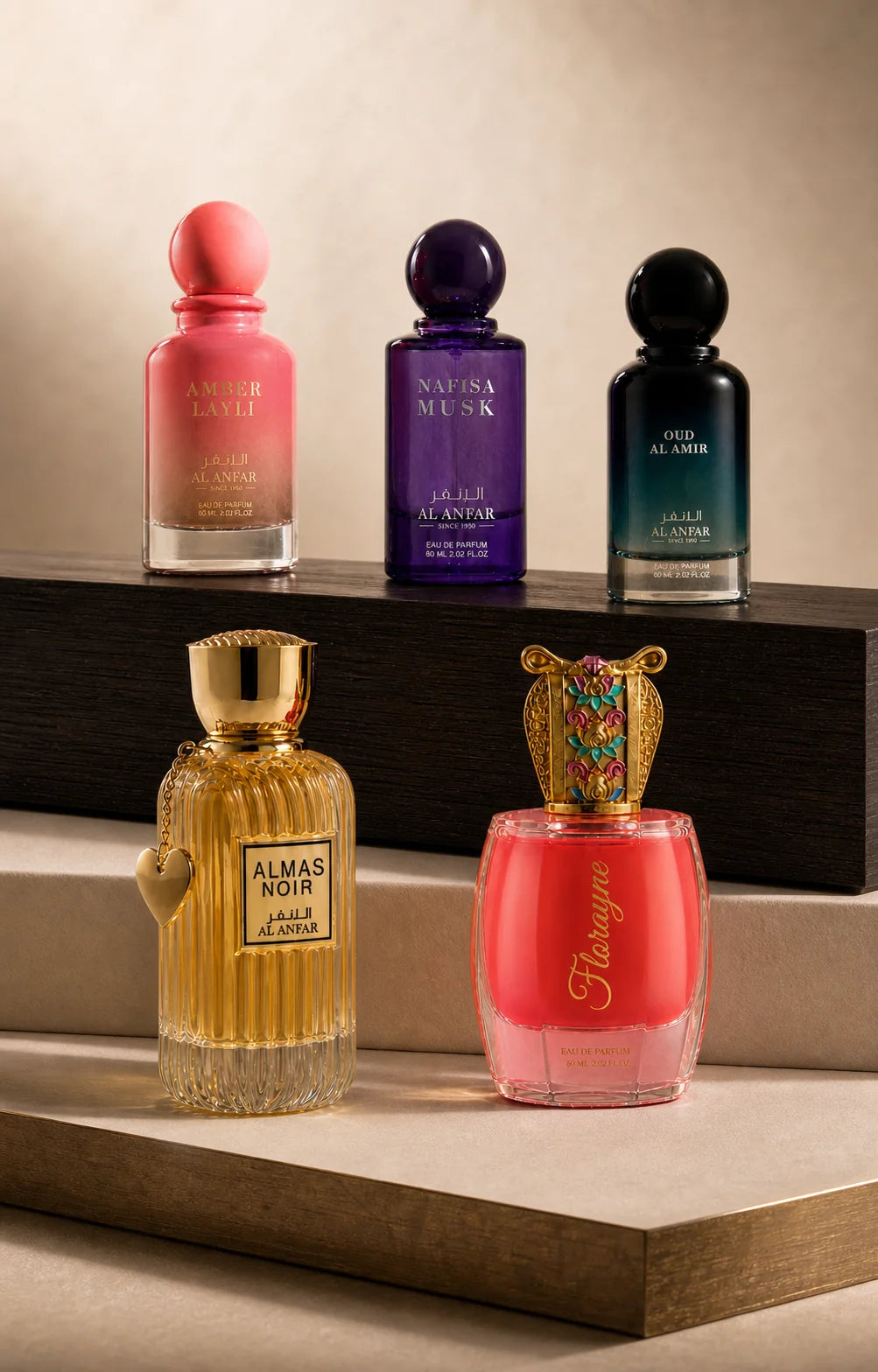 Five Al Anfar fragrances arranged across a two-tier architectural composition